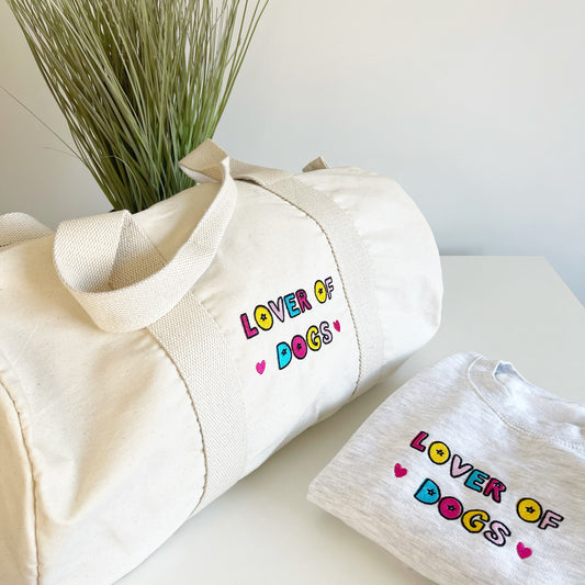 Lover of Dogs Essentials Barrell Bag